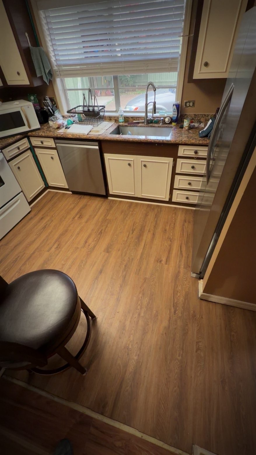 Beautiful Kitchen with Granite Countertops and Wood Flooring